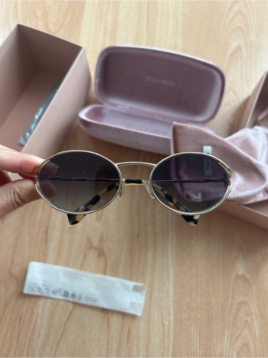 Miu Miu Accessories - Authentic Miu Miu 52YS Oval sunglasses with pale gold frame & grey gradient lens